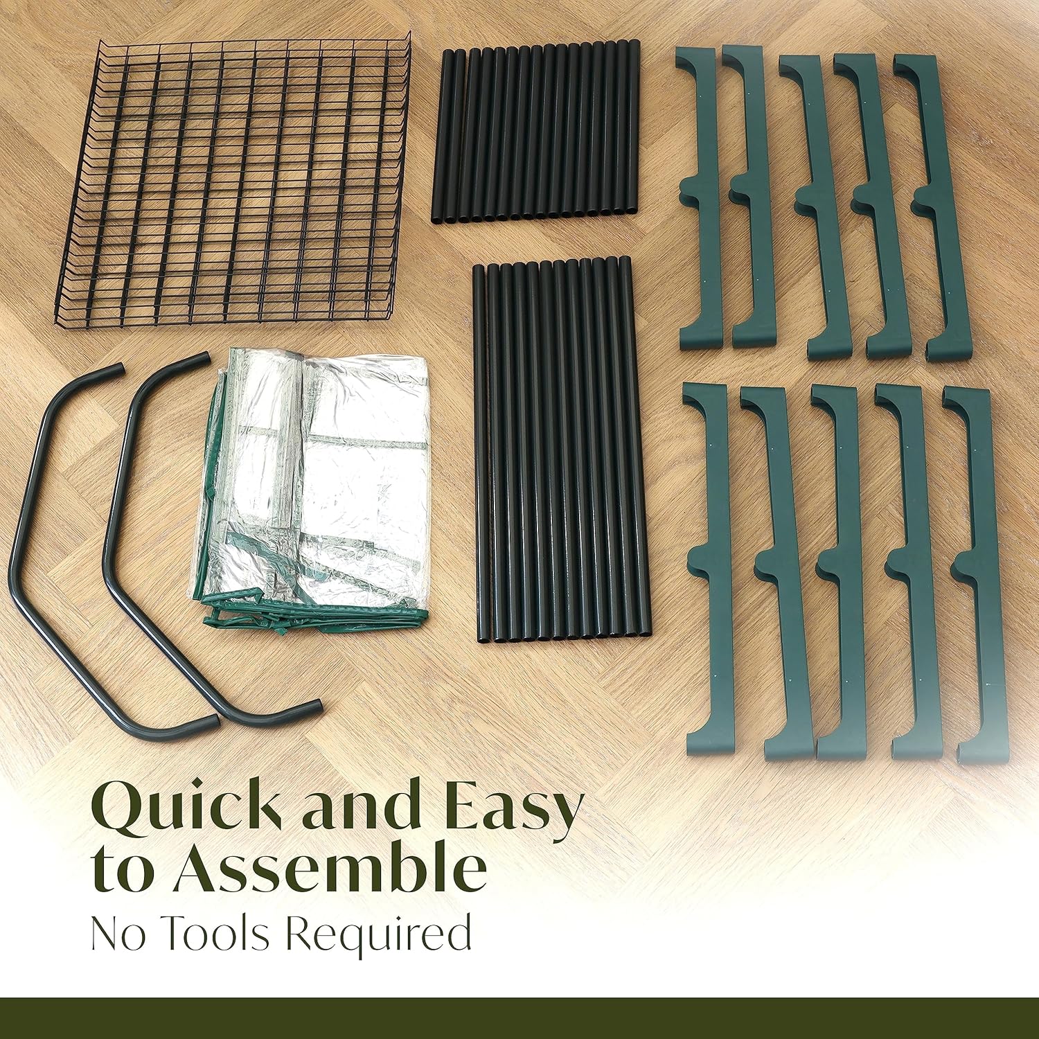Greenhouse components on a wooden floor with text 'Quick and Easy to Assemble, No Tools Required'.