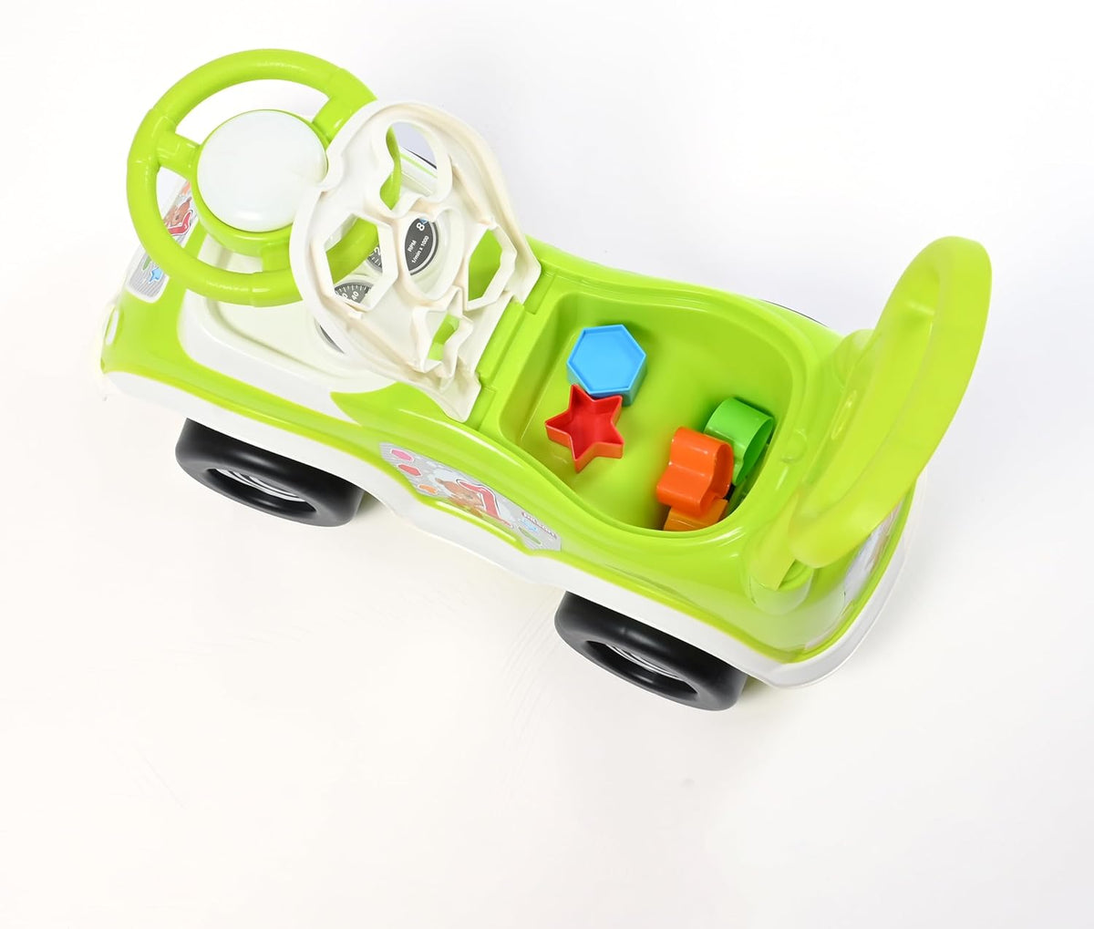 Green ride on car with seat lifted showing storage and shape blocks