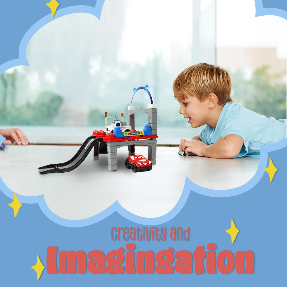 Child playing with the DIVCHI car track playset