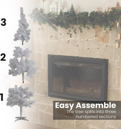 Decorative Christmas trees with assembly instructions in front of a fireplace.