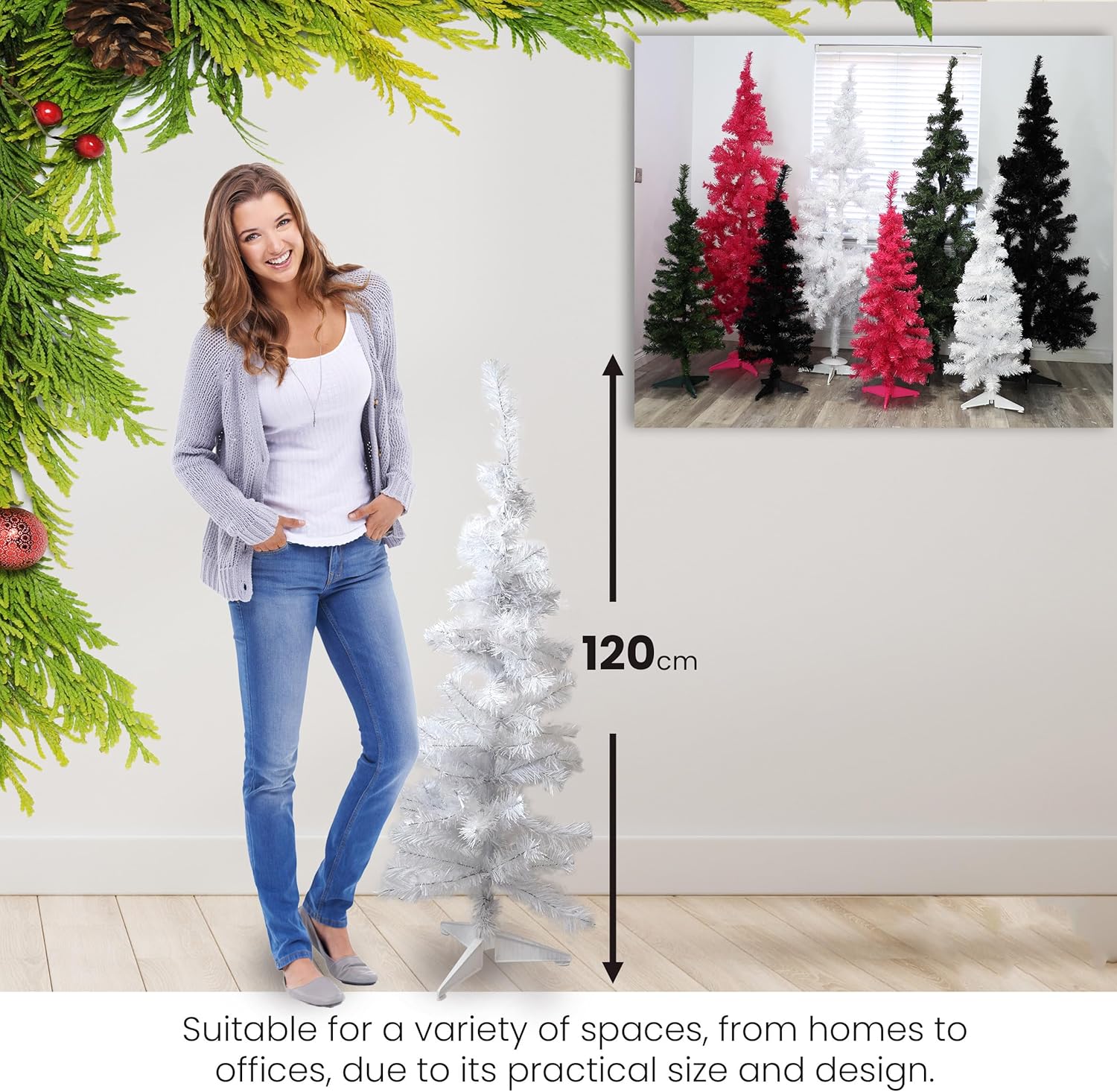 Woman standing next to a small white Christmas tree with a measurement label, surrounded by festive decorations.